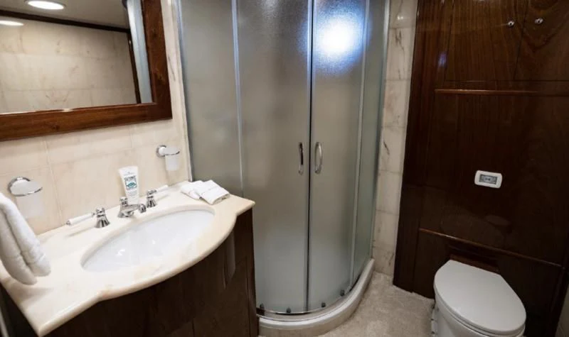 a bathroom with a glass shower aboard FRANCESCO PETRARCA Yacht for Sale