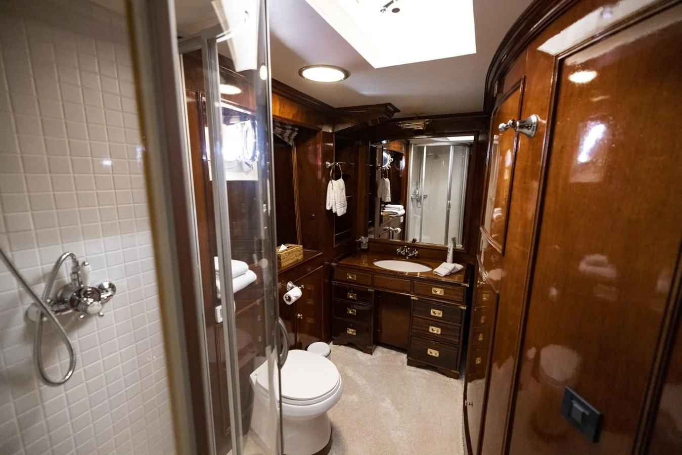 a bathroom with a toilet and a sink aboard FRANCESCO PETRARCA Yacht for Sale