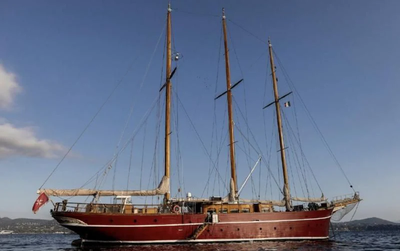 a red and white sailboat aboard FRANCESCO PETRARCA Yacht for Sale