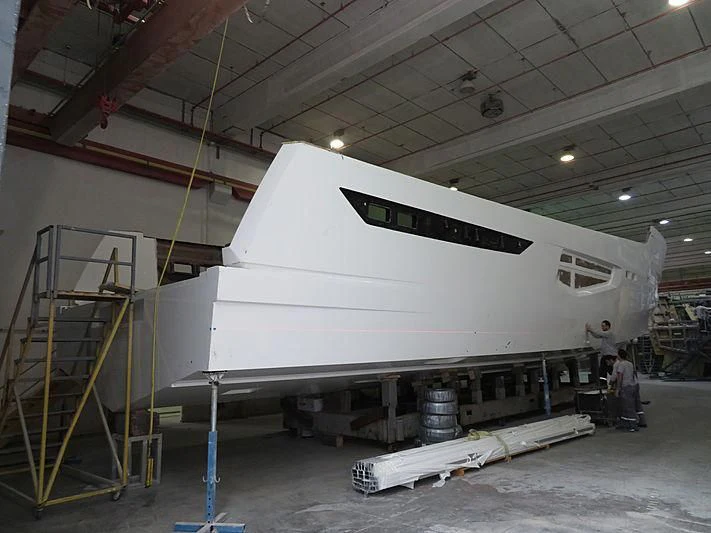 a large white machine in a warehouse aboard SUN RISE Yacht for Sale