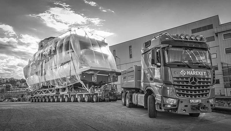 a truck parked in front of a building aboard SUN RISE Yacht for Sale