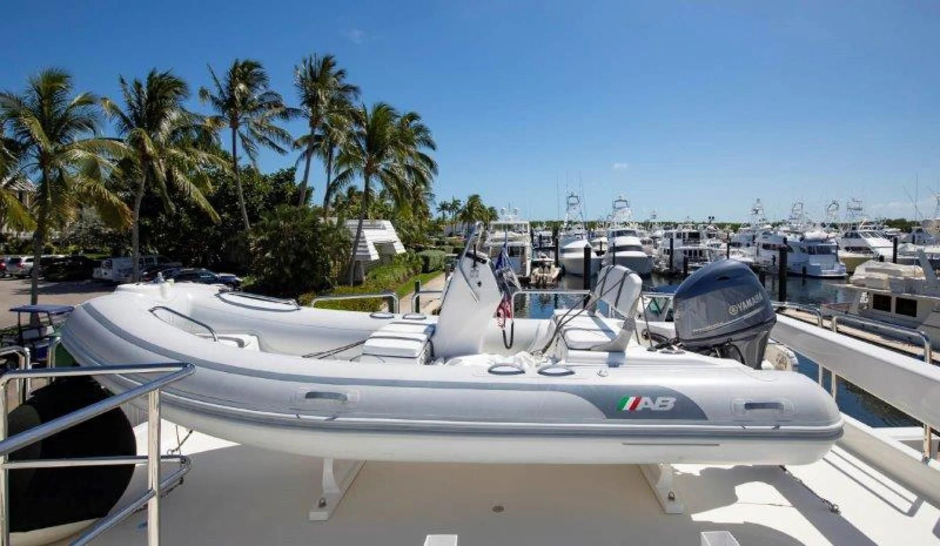 a group of boats parked in a harbor aboard CHERRY BOMB Yacht for Sale