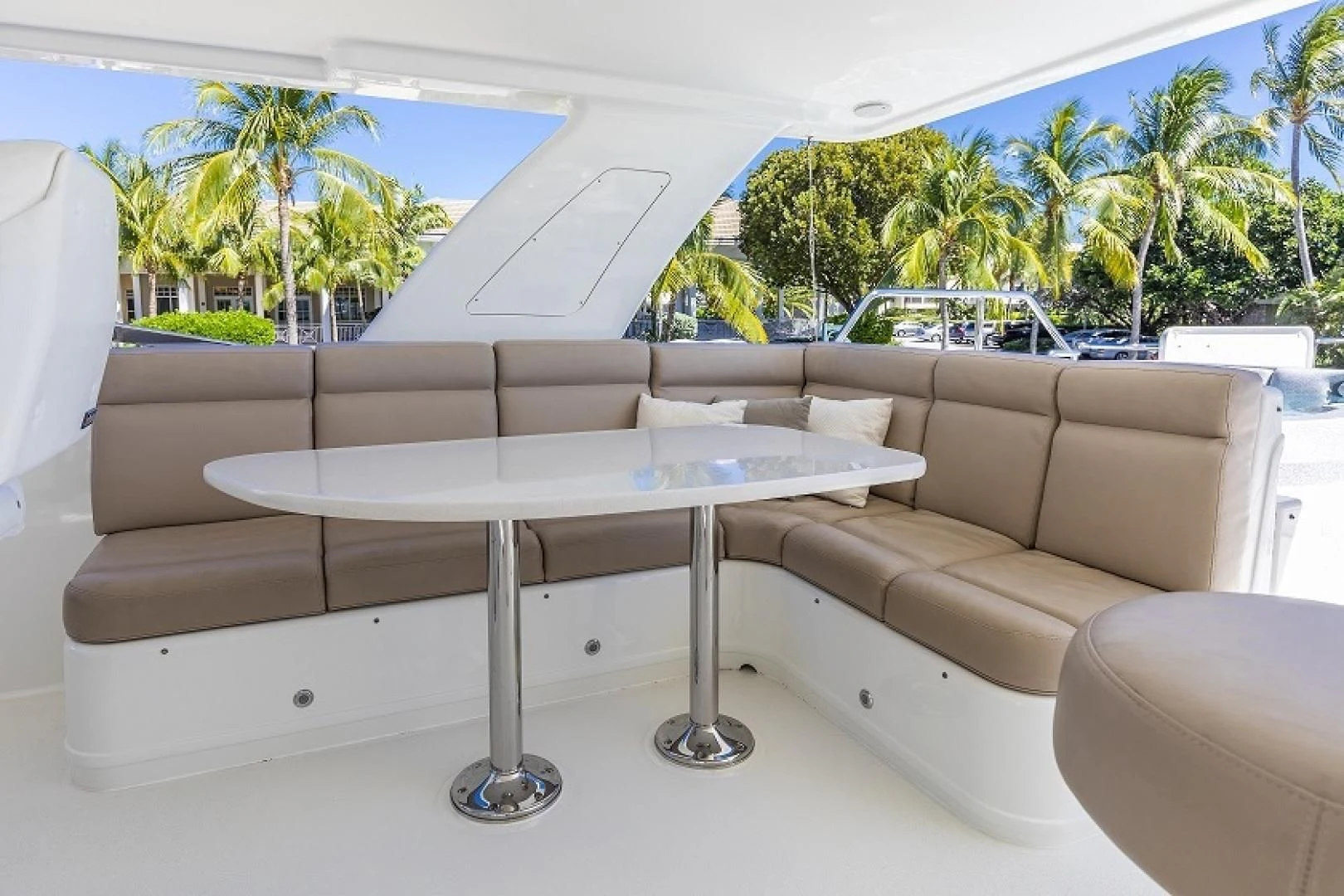 a table and couch in a room aboard CHERRY BOMB Yacht for Sale