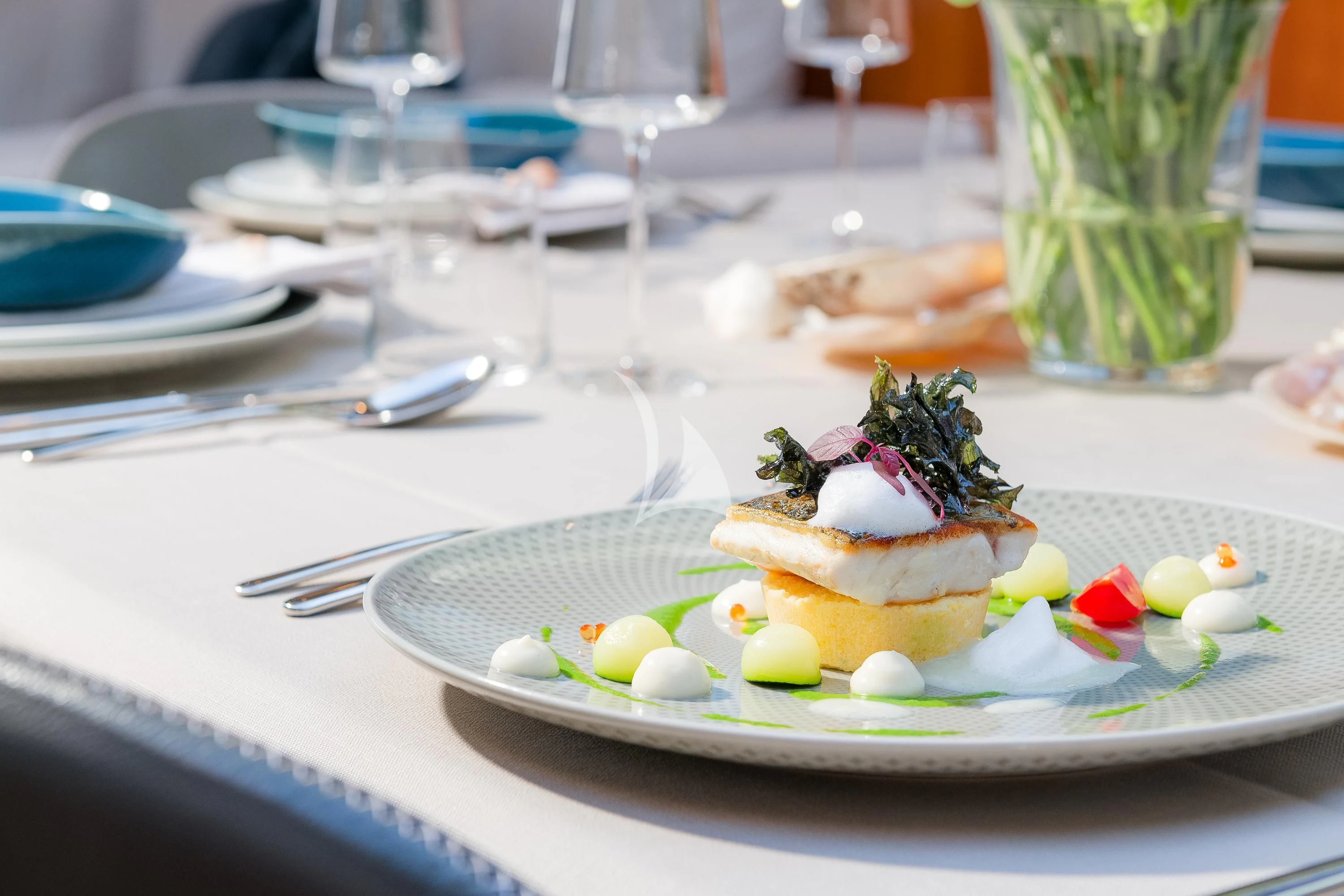 a dessert on a plate aboard QUANTUM Yacht for Sale