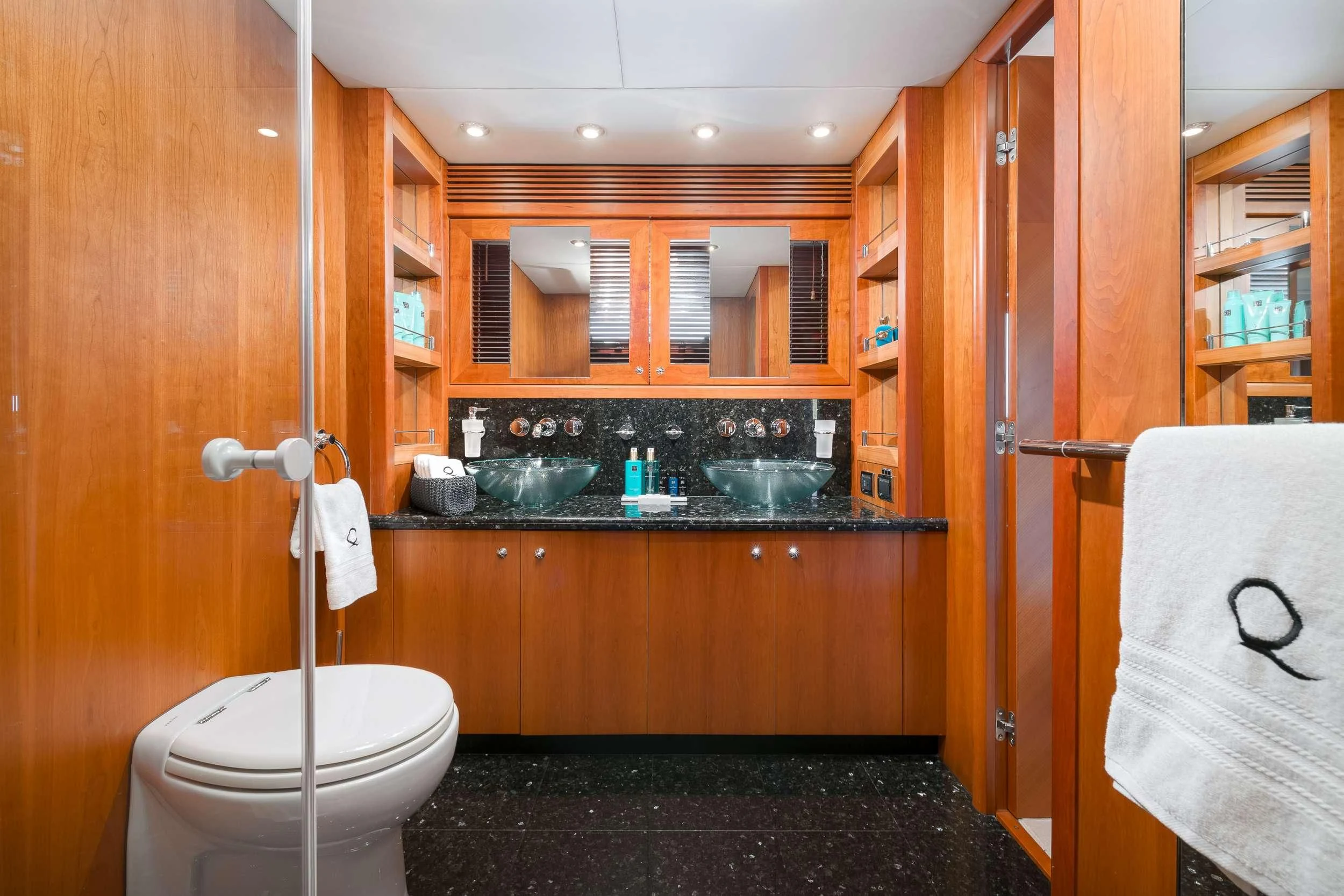 a bathroom with a sink and toilet aboard QUANTUM Yacht for Sale