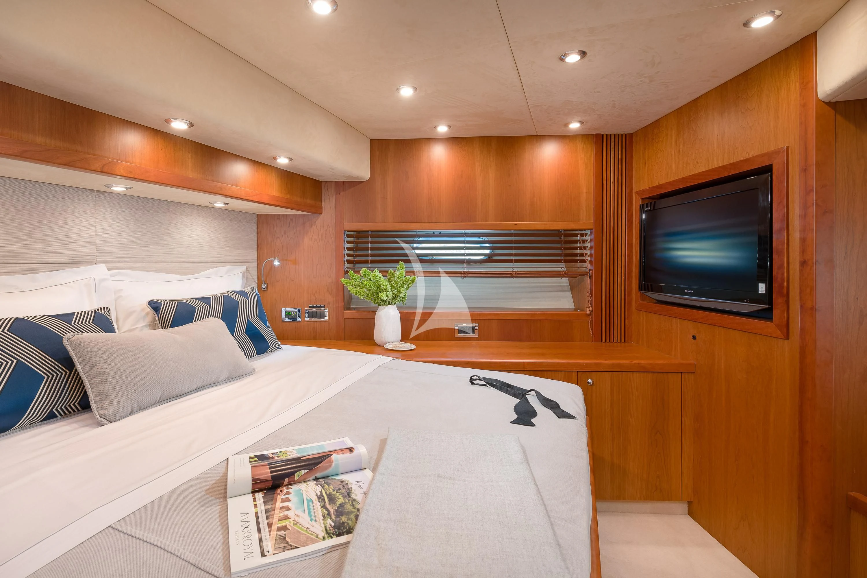 a room with a bed and a tv aboard QUANTUM Yacht for Sale