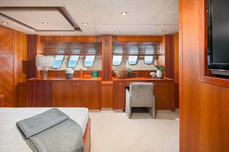 a room with a table and chairs aboard QUANTUM Yacht for Sale