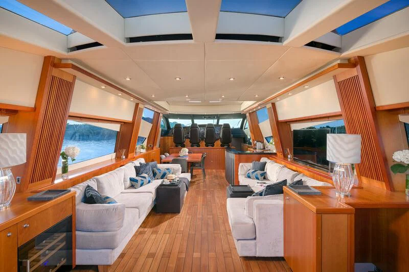 a living room with a large window aboard QUANTUM Yacht for Sale
