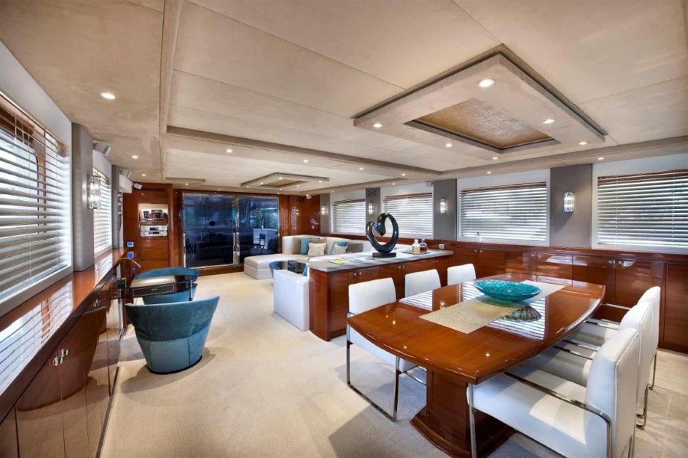 a large room with a table and chairs aboard MERMAID Yacht for Sale