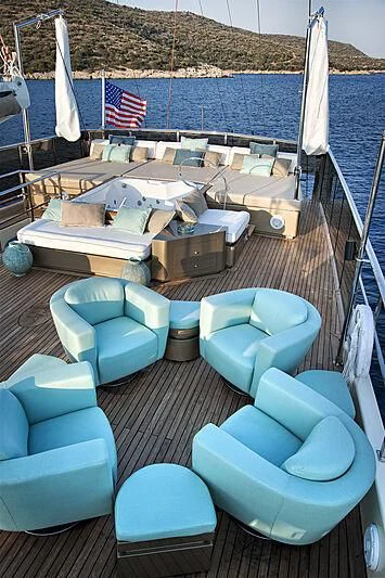 a boat on a deck aboard MERMAID Yacht for Sale