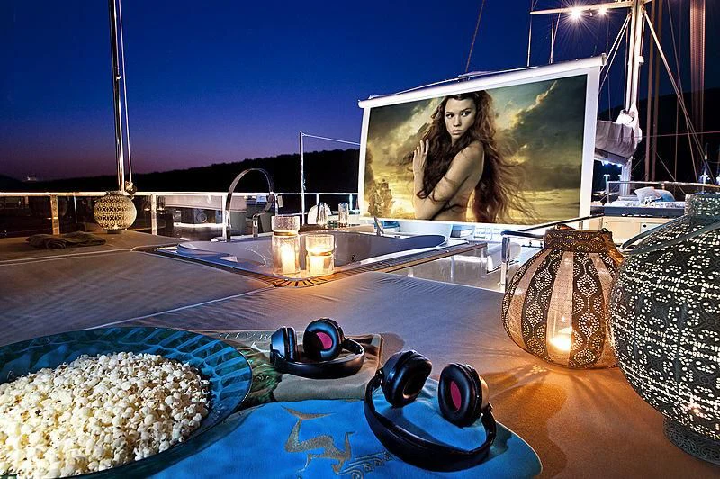 a table with a mirror and a picture on it aboard MERMAID Yacht for Sale