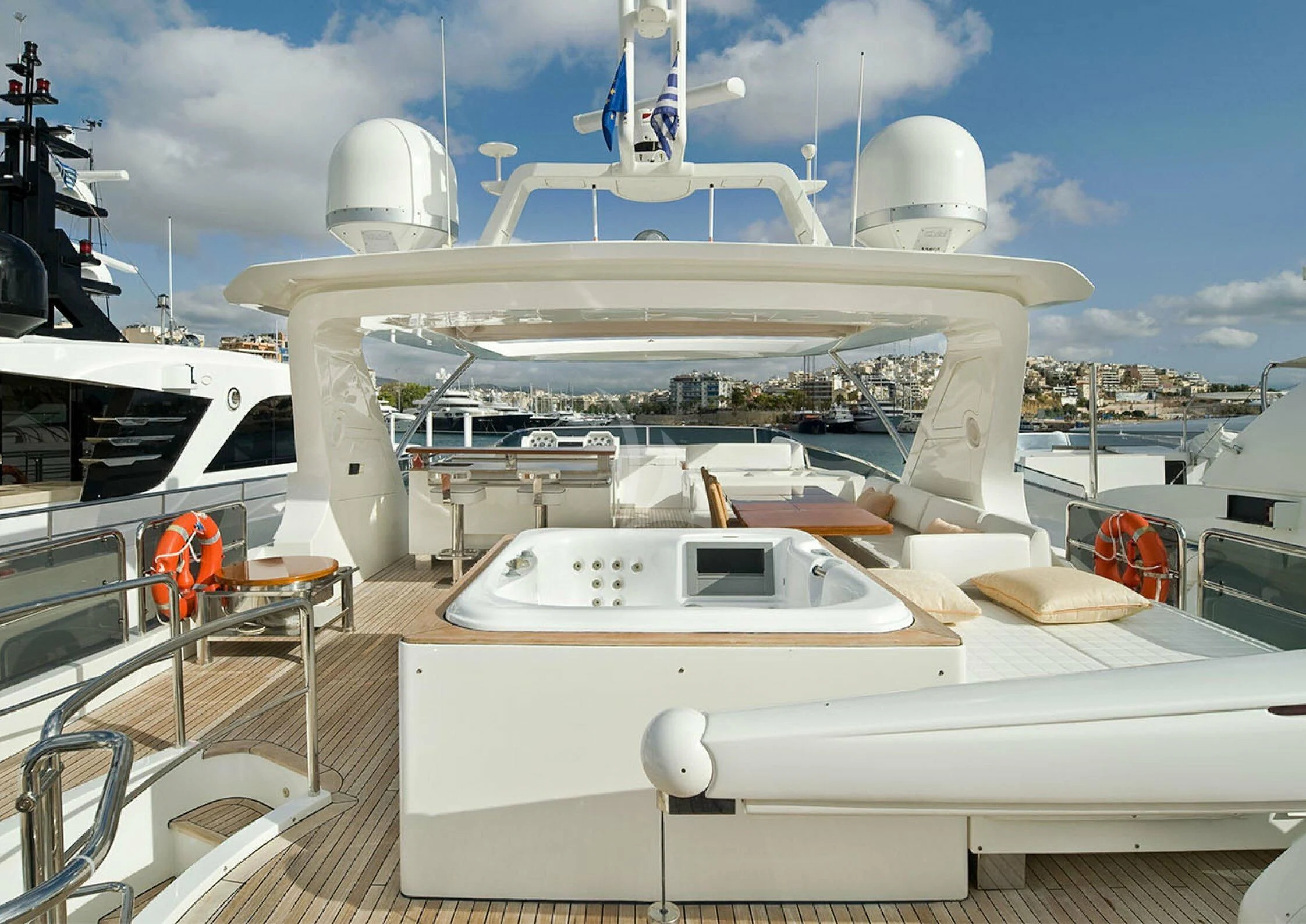 a white boat with a white sail aboard KOUKLES Yacht for Sale