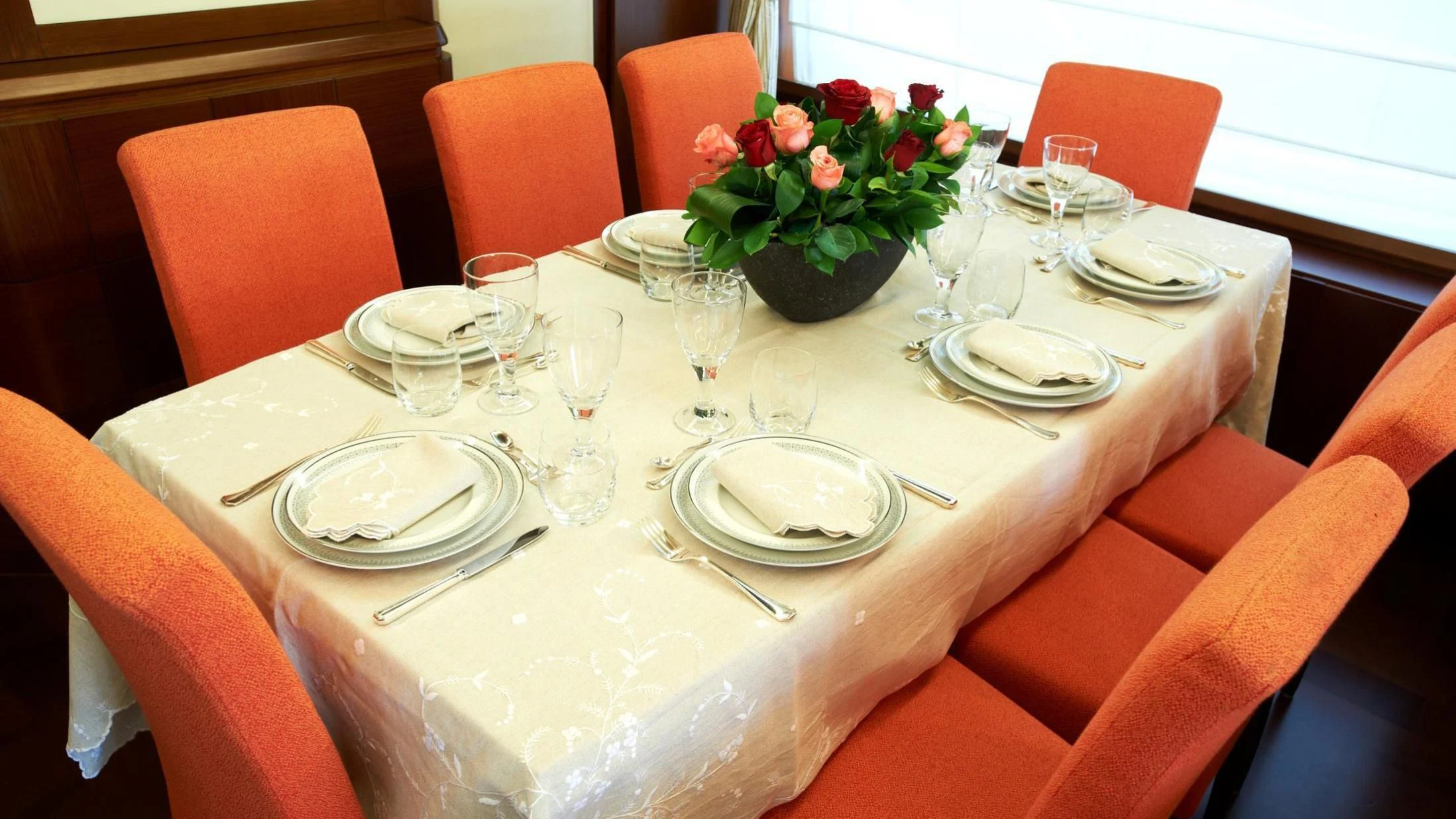 a table set with place settings aboard KOUKLES Yacht for Sale