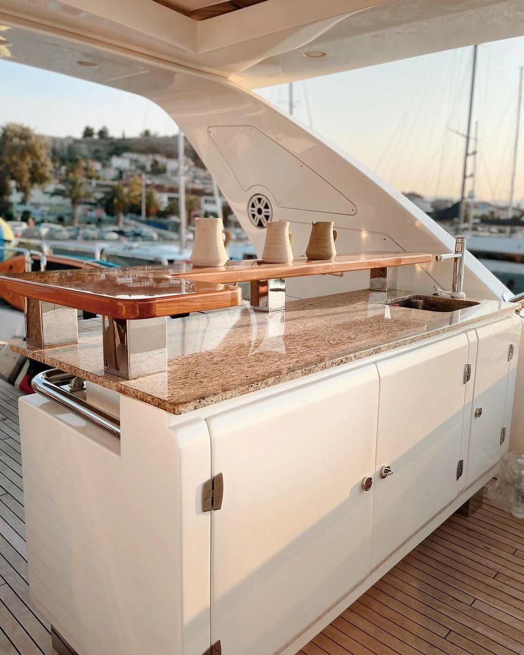 a kitchen with a large window aboard KOUKLES Yacht for Sale