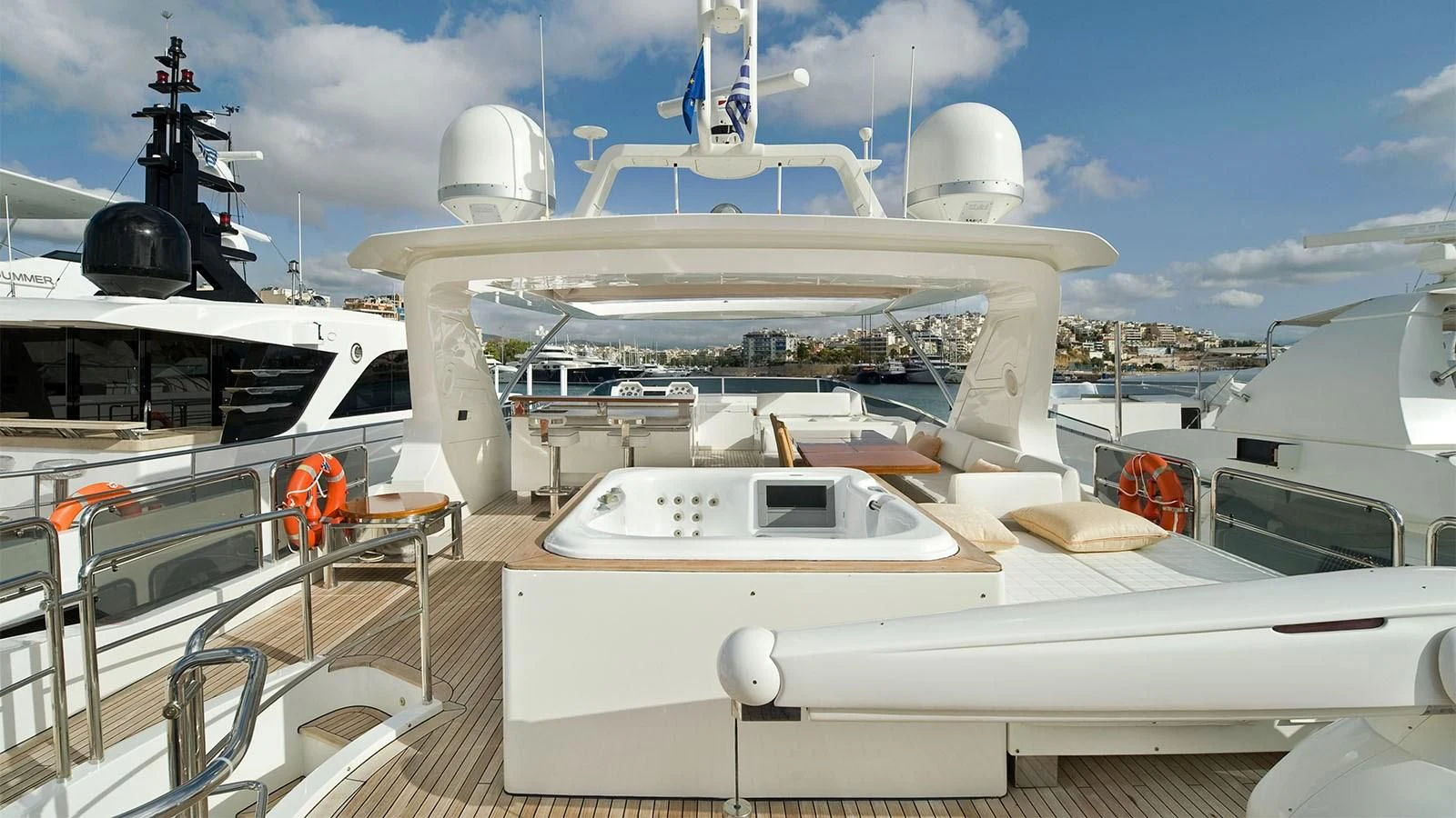 a white boat with a white sail aboard KOUKLES Yacht for Sale