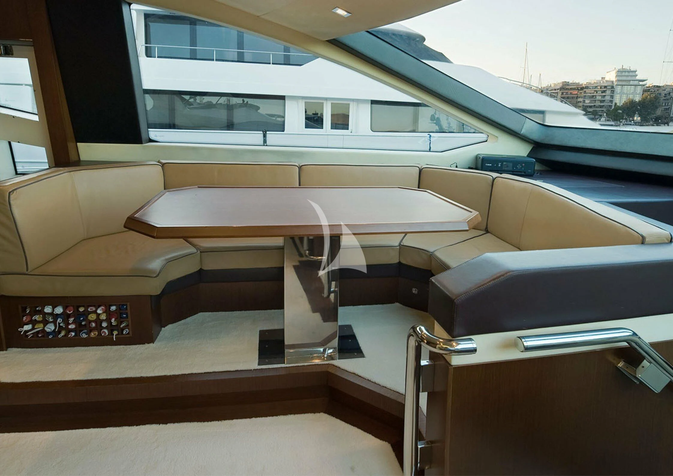 a room with a couch and a table aboard KOUKLES Yacht for Sale