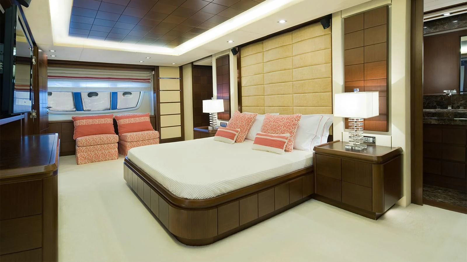 a hotel room with a bed and a couch aboard KOUKLES Yacht for Sale