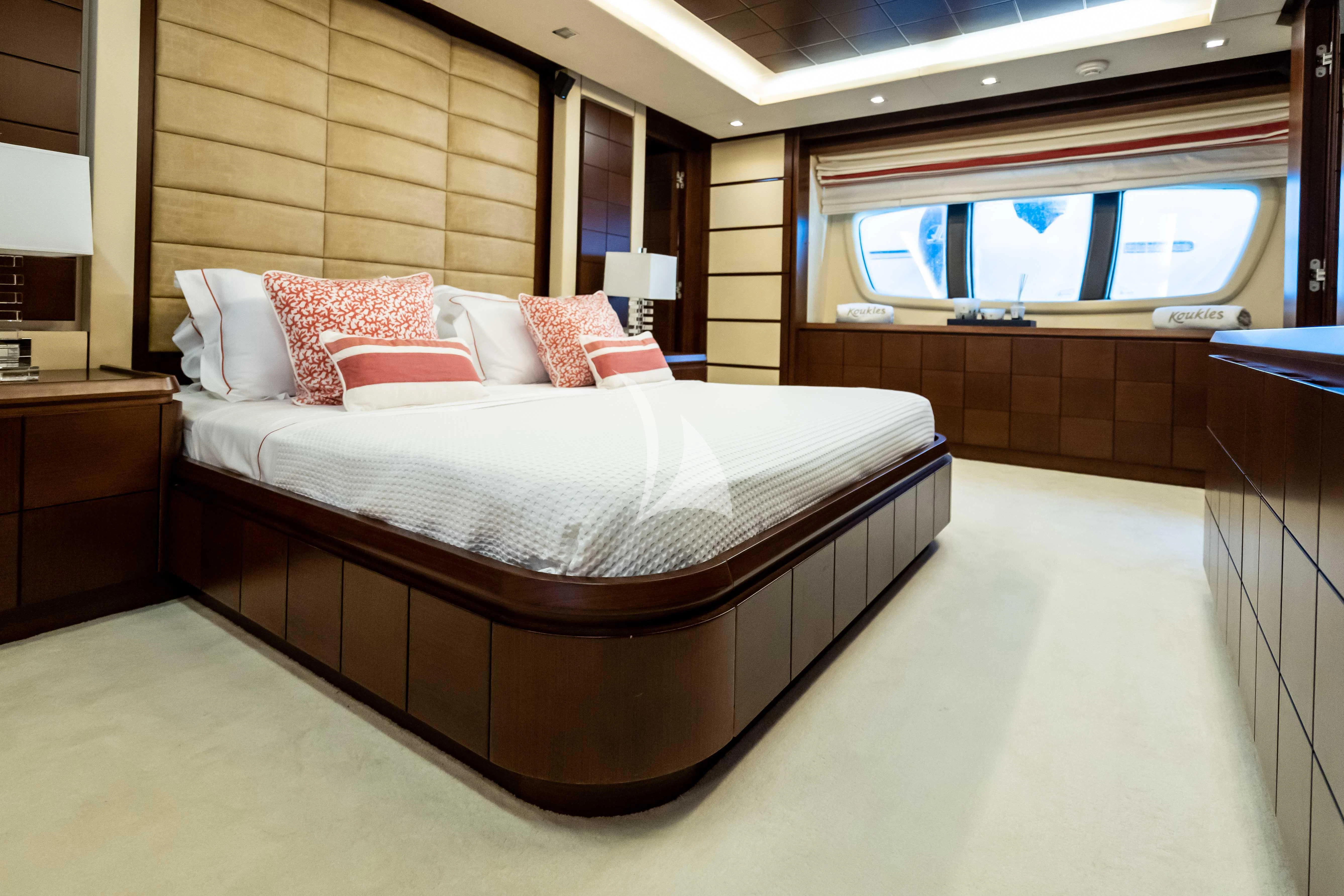 a large bed in a room aboard KOUKLES Yacht for Sale