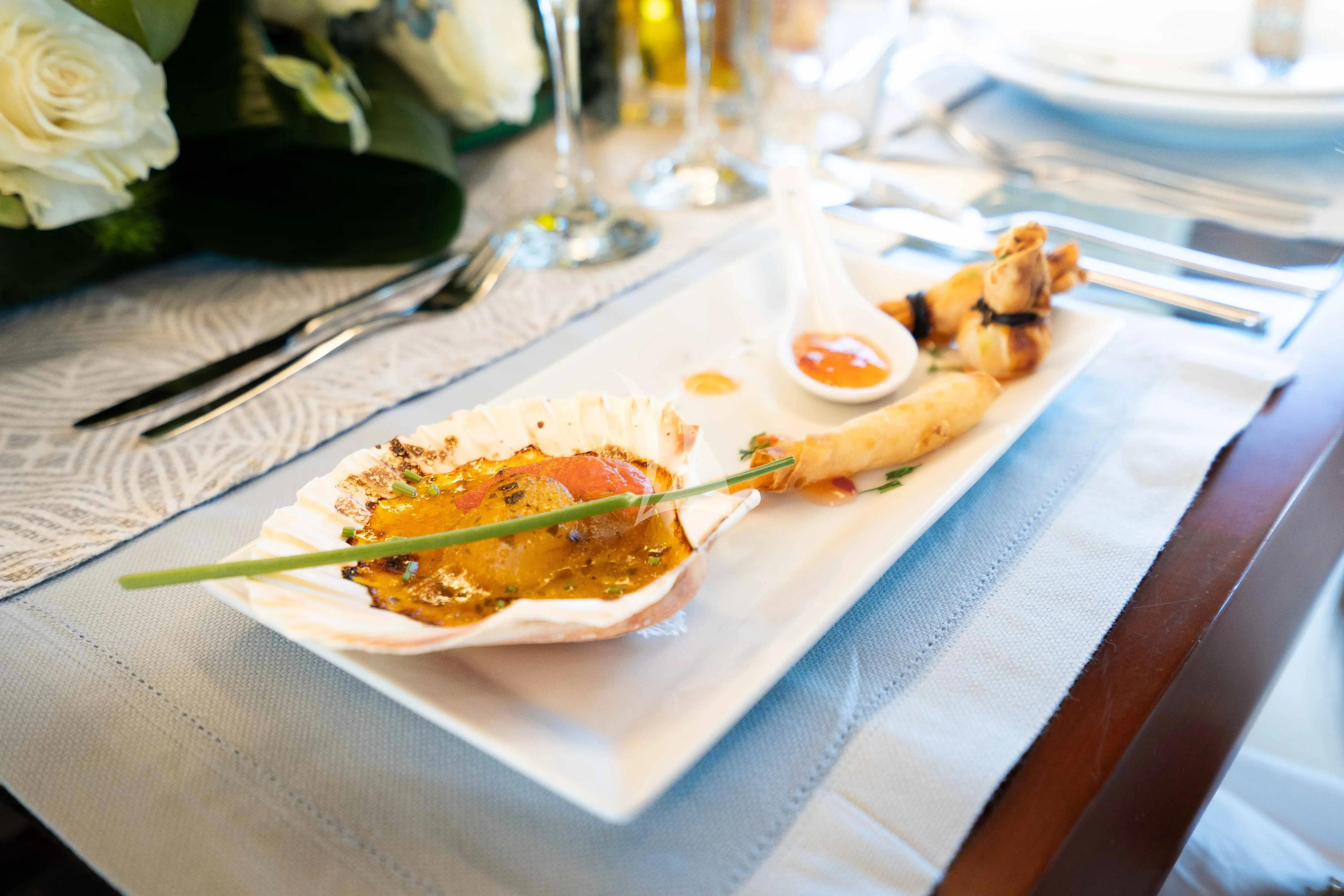a plate of food aboard KOUKLES Yacht for Sale
