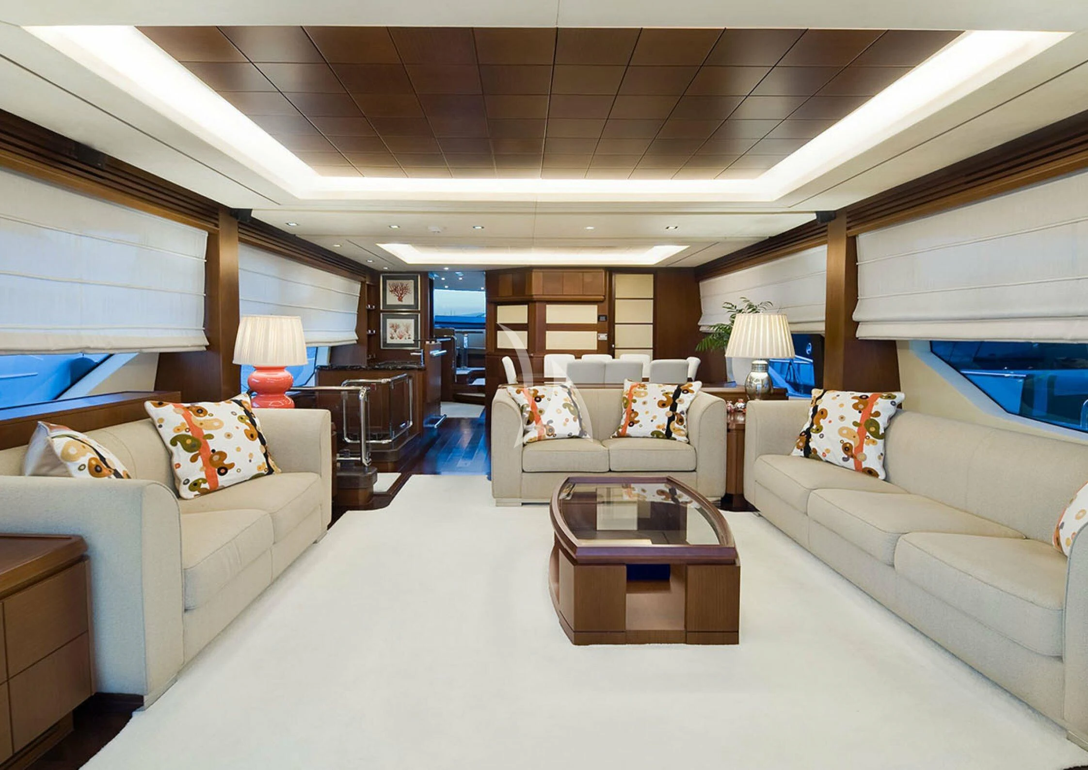 a living room with a couch and a table aboard KOUKLES Yacht for Sale