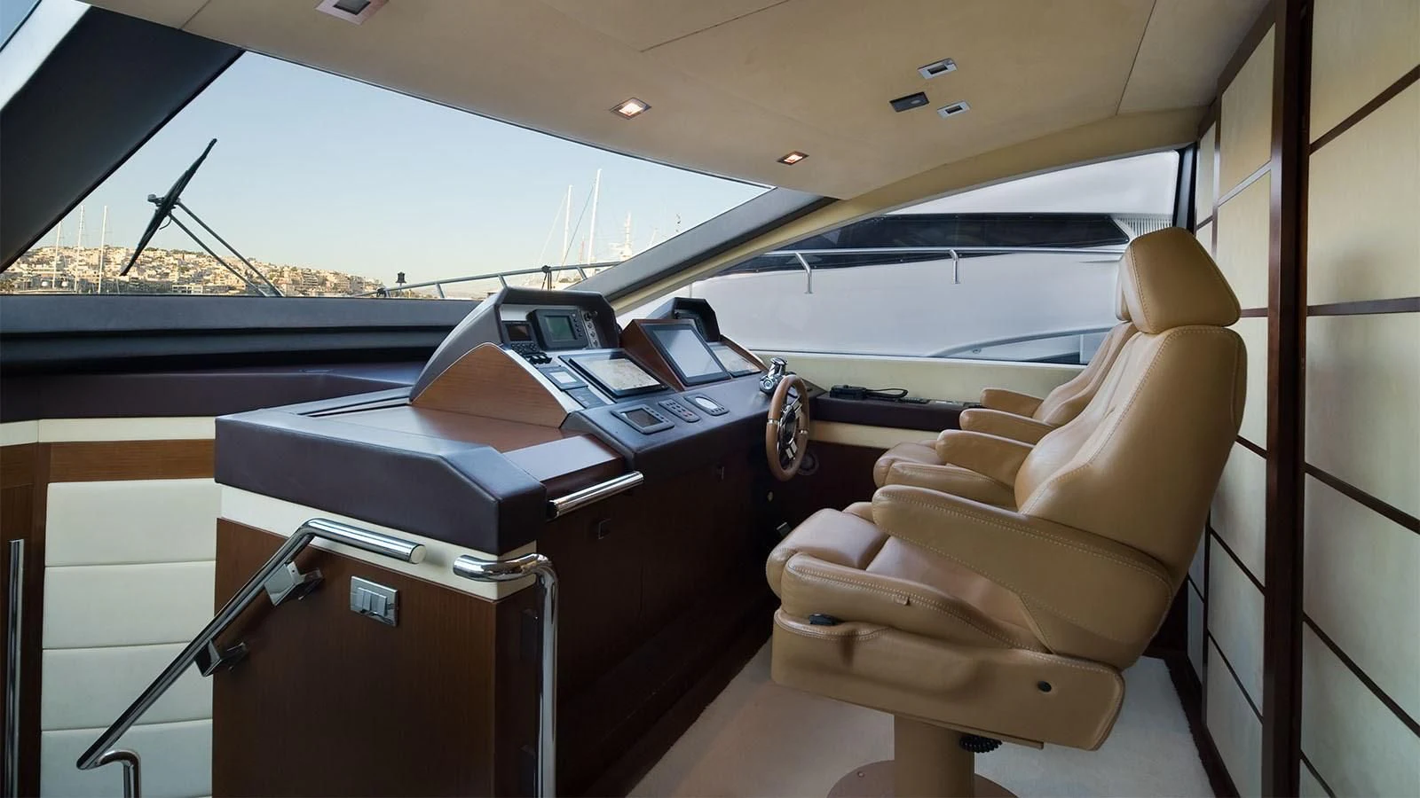 a boat with a desk and a chair aboard KOUKLES Yacht for Sale