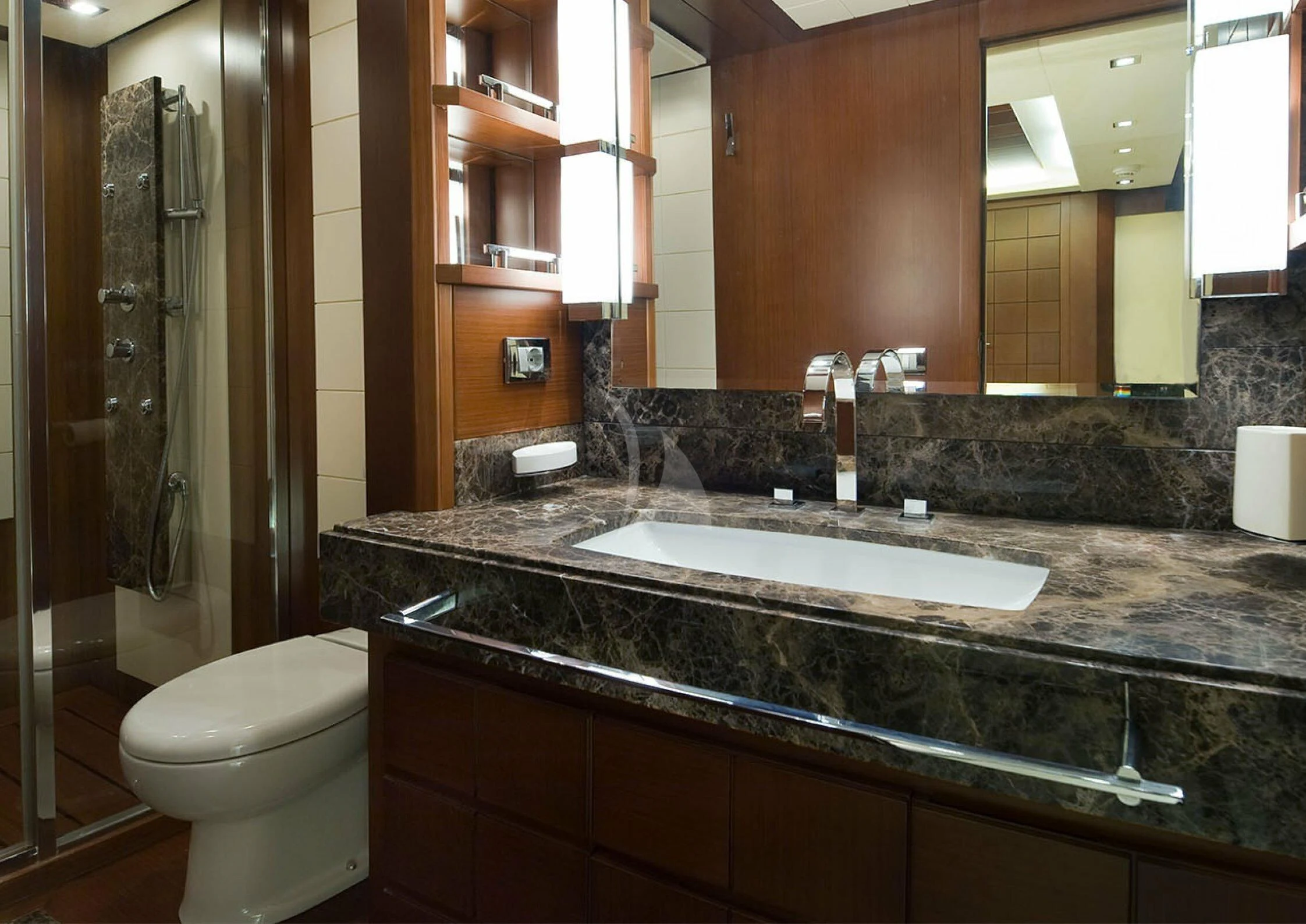 a bathroom with a marble counter top aboard KOUKLES Yacht for Sale