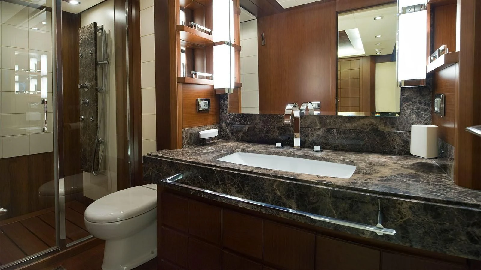 a bathroom with a marble counter top aboard KOUKLES Yacht for Sale