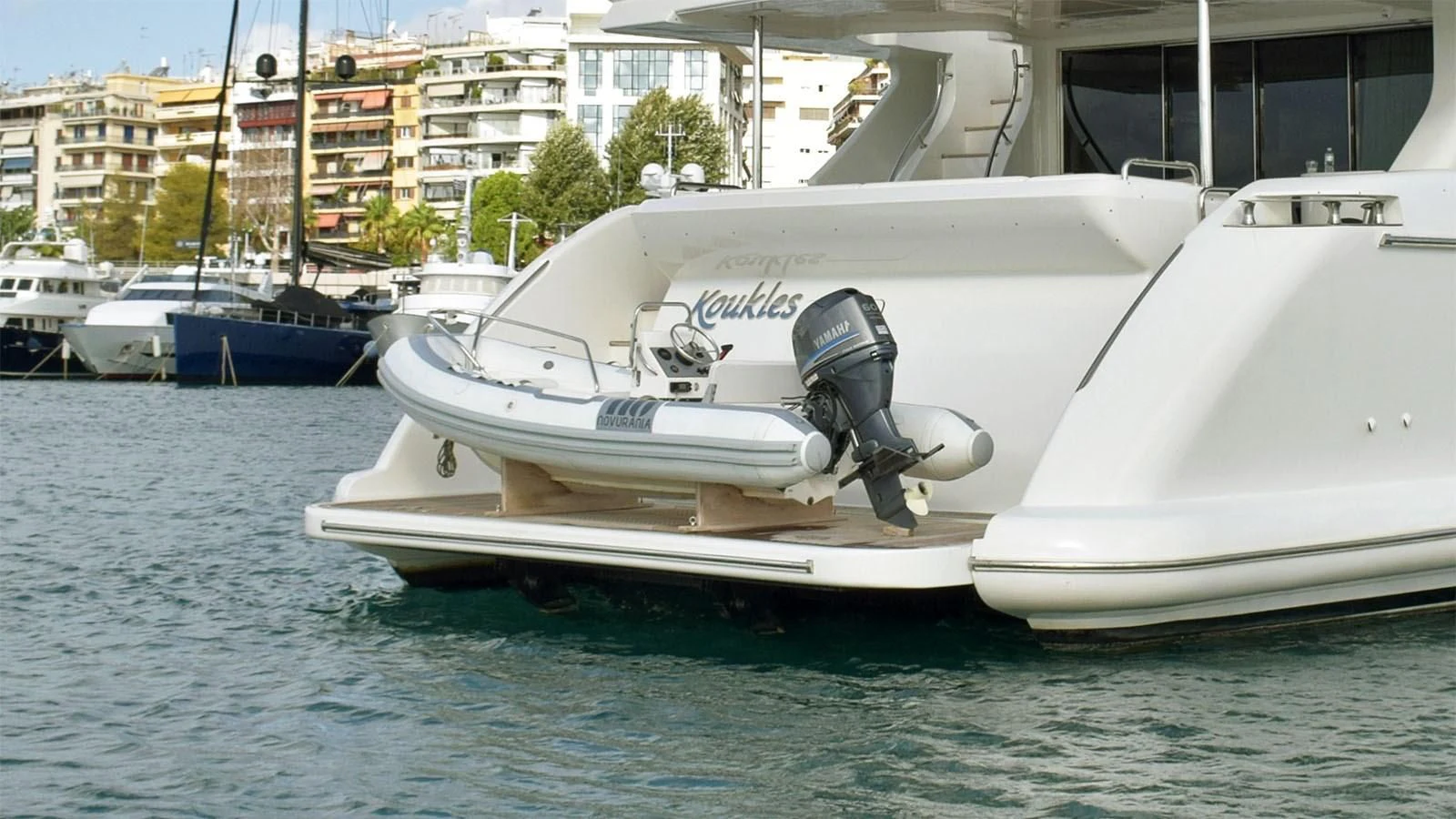 a motor boat on the water aboard KOUKLES Yacht for Sale