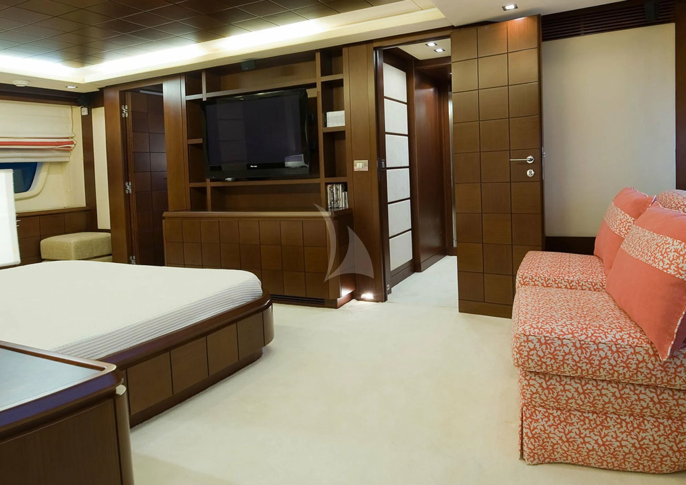 a hotel room with a bed and a tv aboard KOUKLES Yacht for Sale