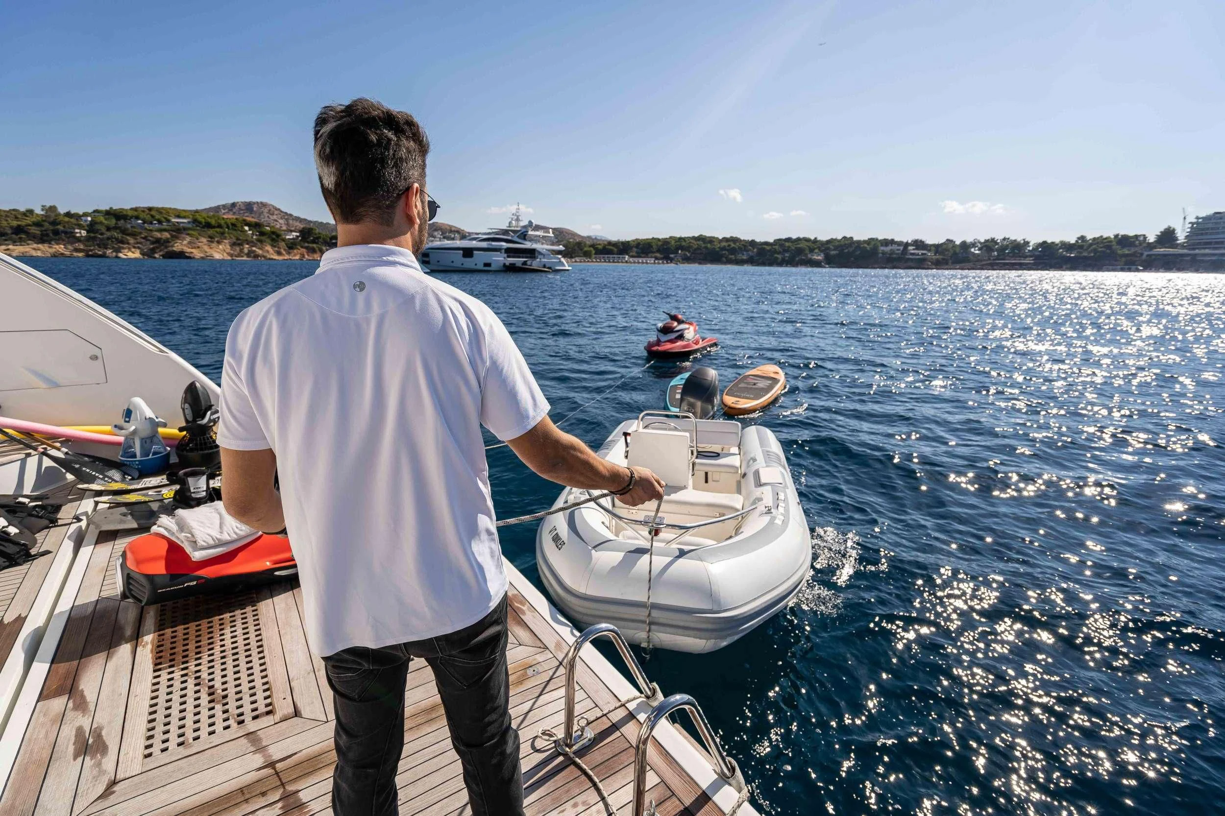 a man on a boat aboard KOUKLES Yacht for Sale