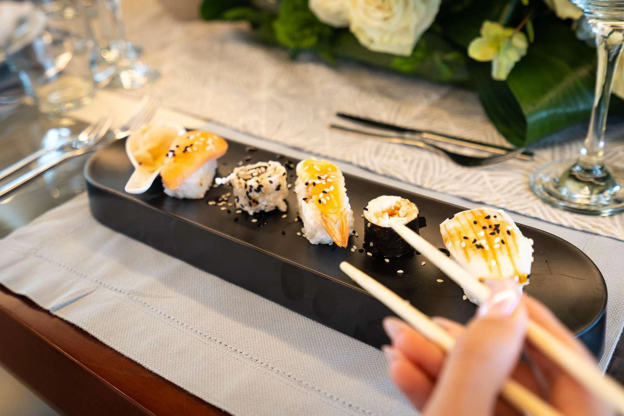 a plate of sushi aboard KOUKLES Yacht for Sale
