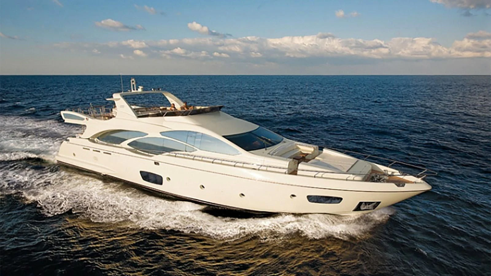 a white yacht on the water aboard KOUKLES Yacht for Sale