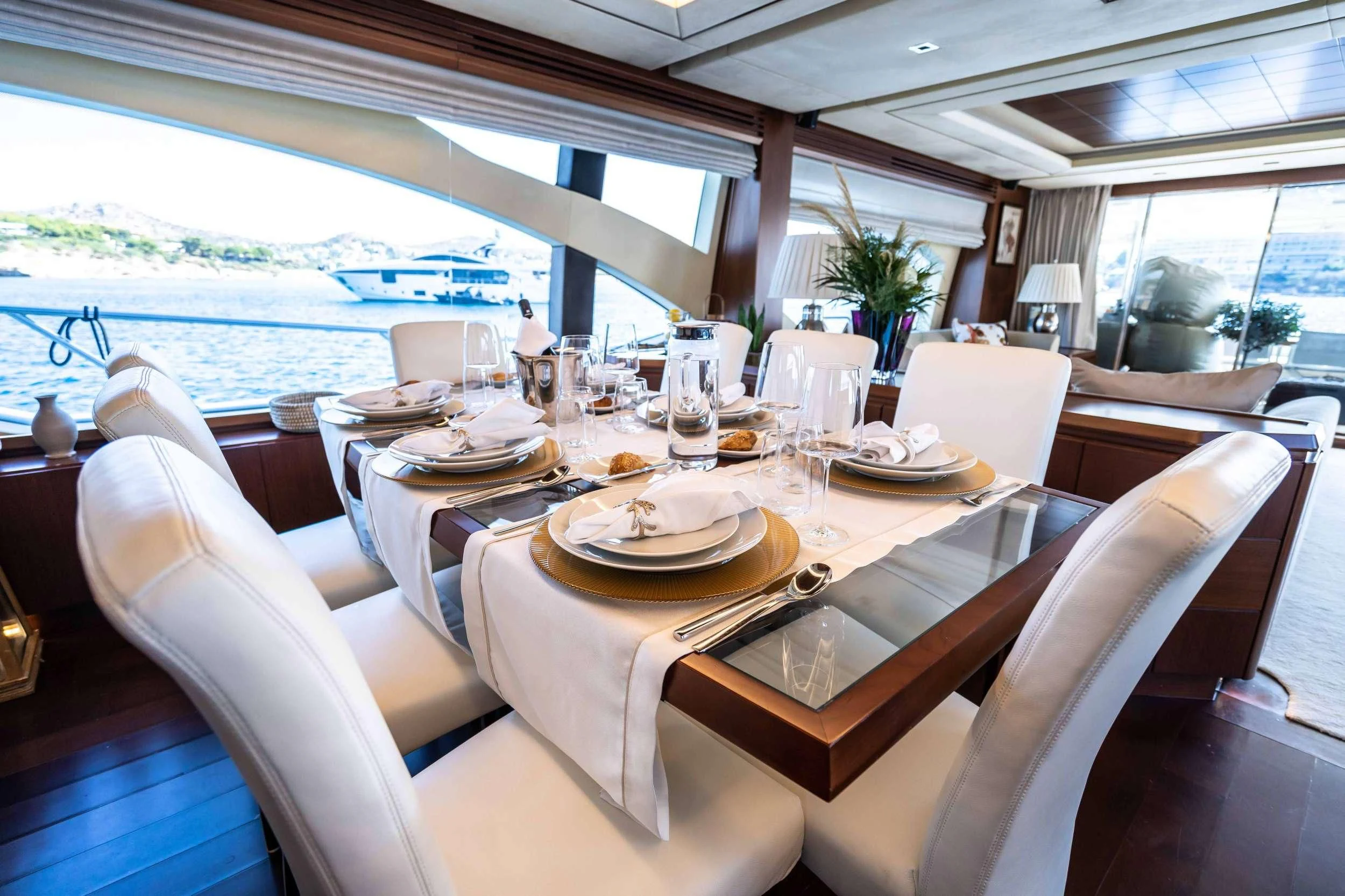 a table set for a dinner aboard KOUKLES Yacht for Sale