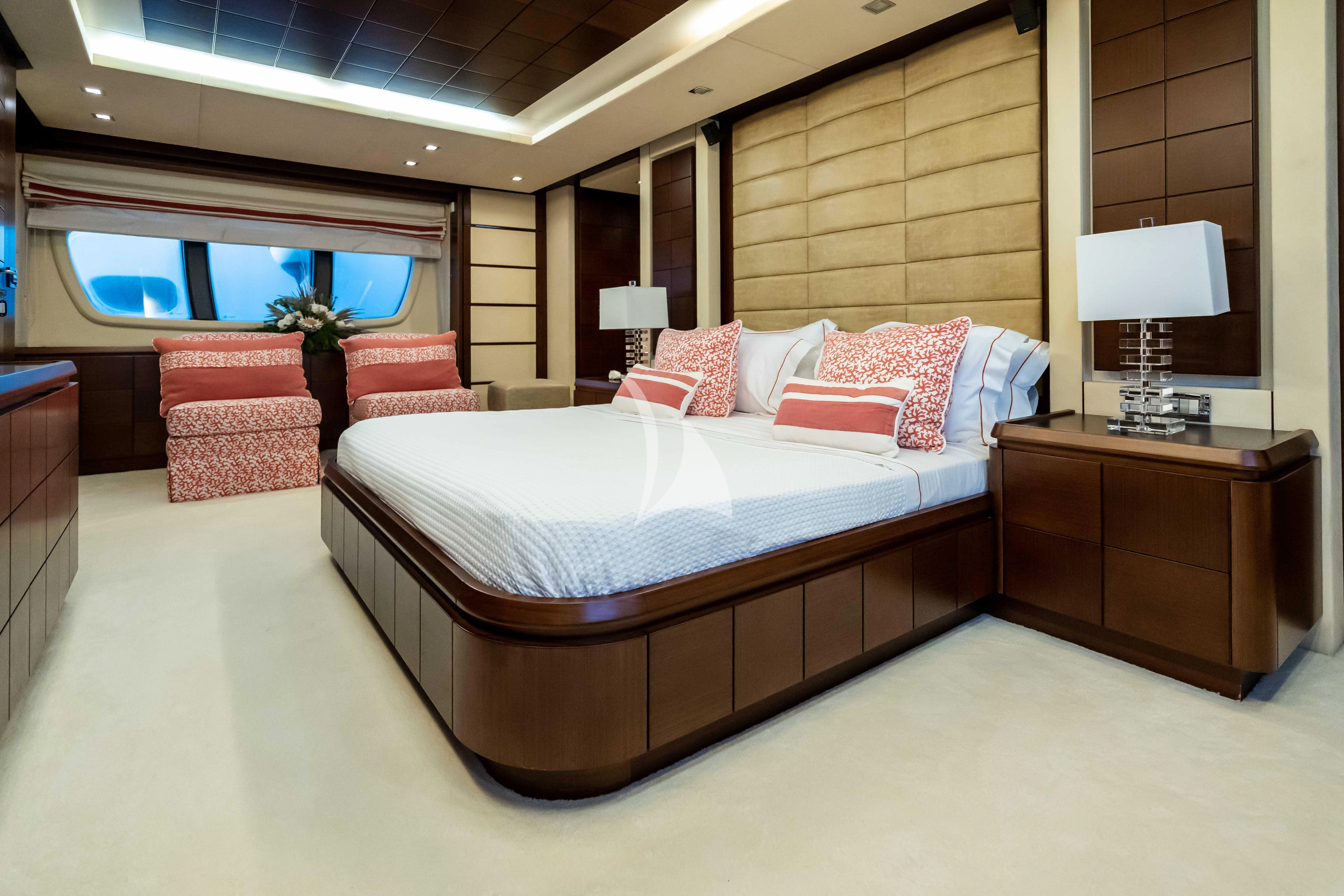 a large bed in a hotel room aboard KOUKLES Yacht for Sale
