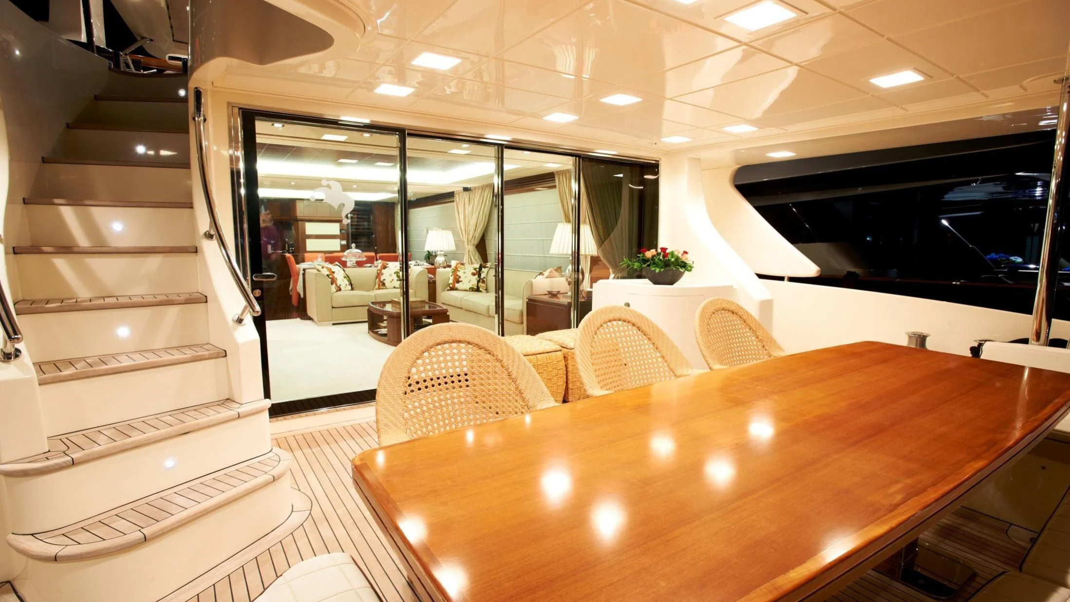 a room with a table and chairs aboard KOUKLES Yacht for Sale