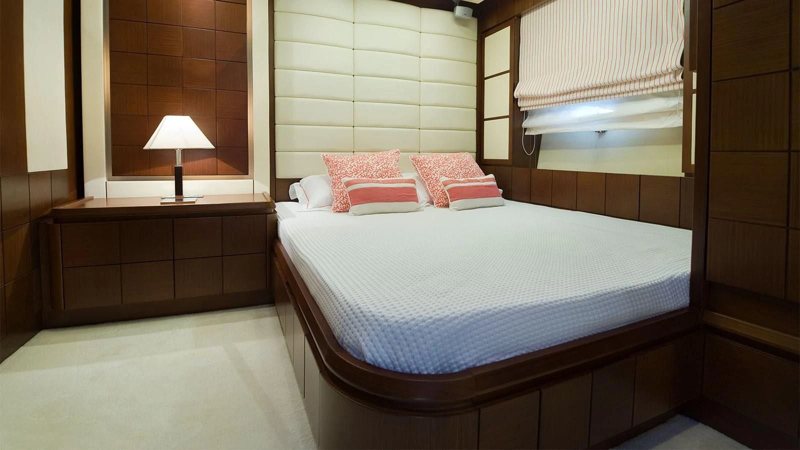 a bed with a white sheet aboard KOUKLES Yacht for Sale