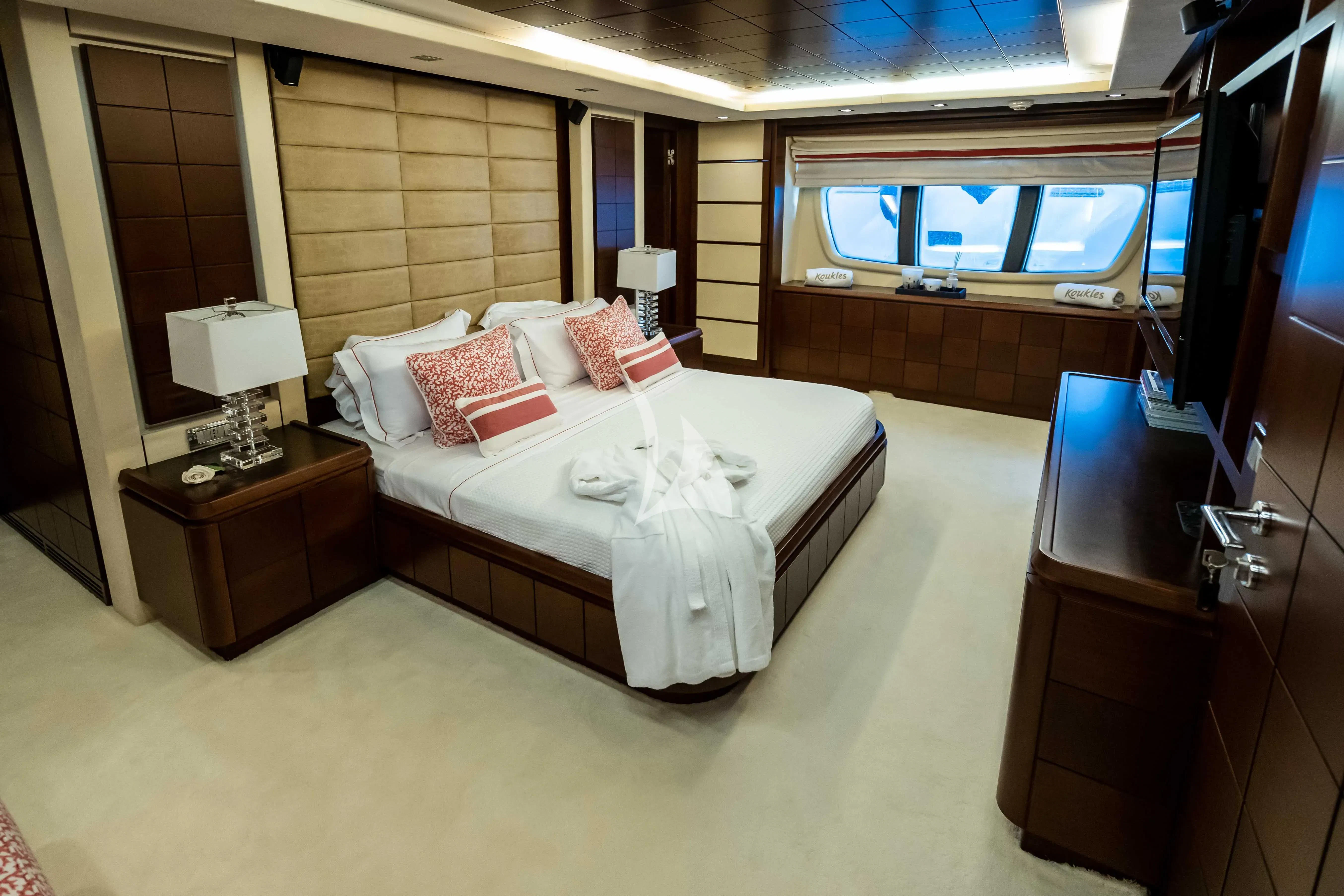 a hotel room with a bed aboard KOUKLES Yacht for Sale