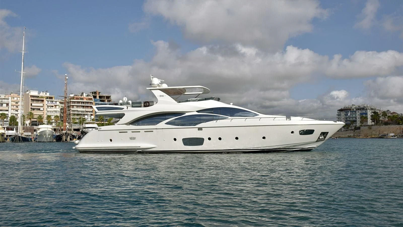 a white yacht in the water aboard KOUKLES Yacht for Sale