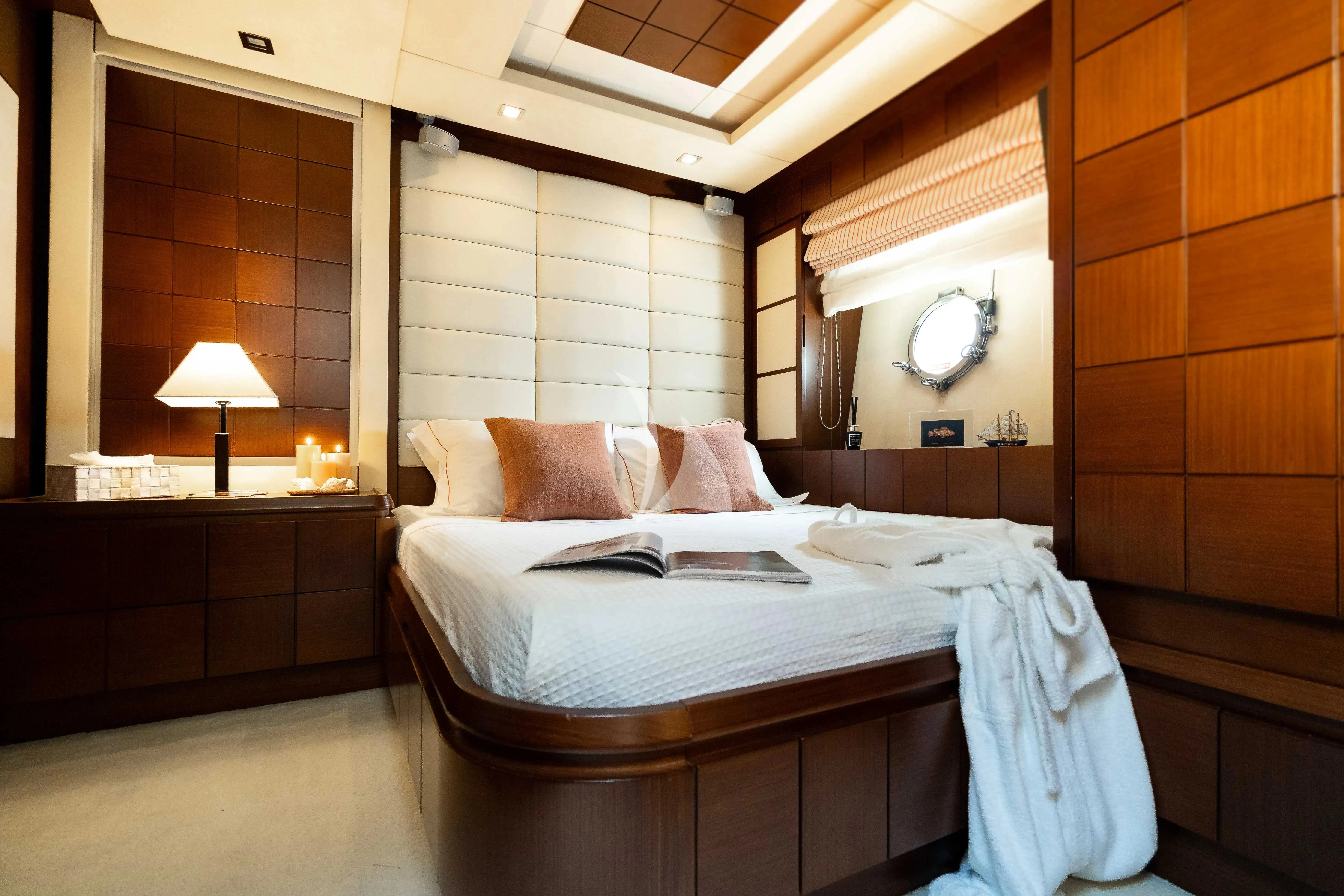 a hotel room with a bed aboard KOUKLES Yacht for Sale