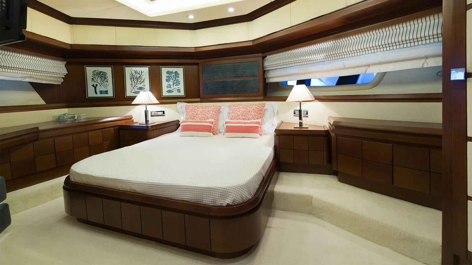 a room with a bed and a desk aboard KOUKLES Yacht for Sale