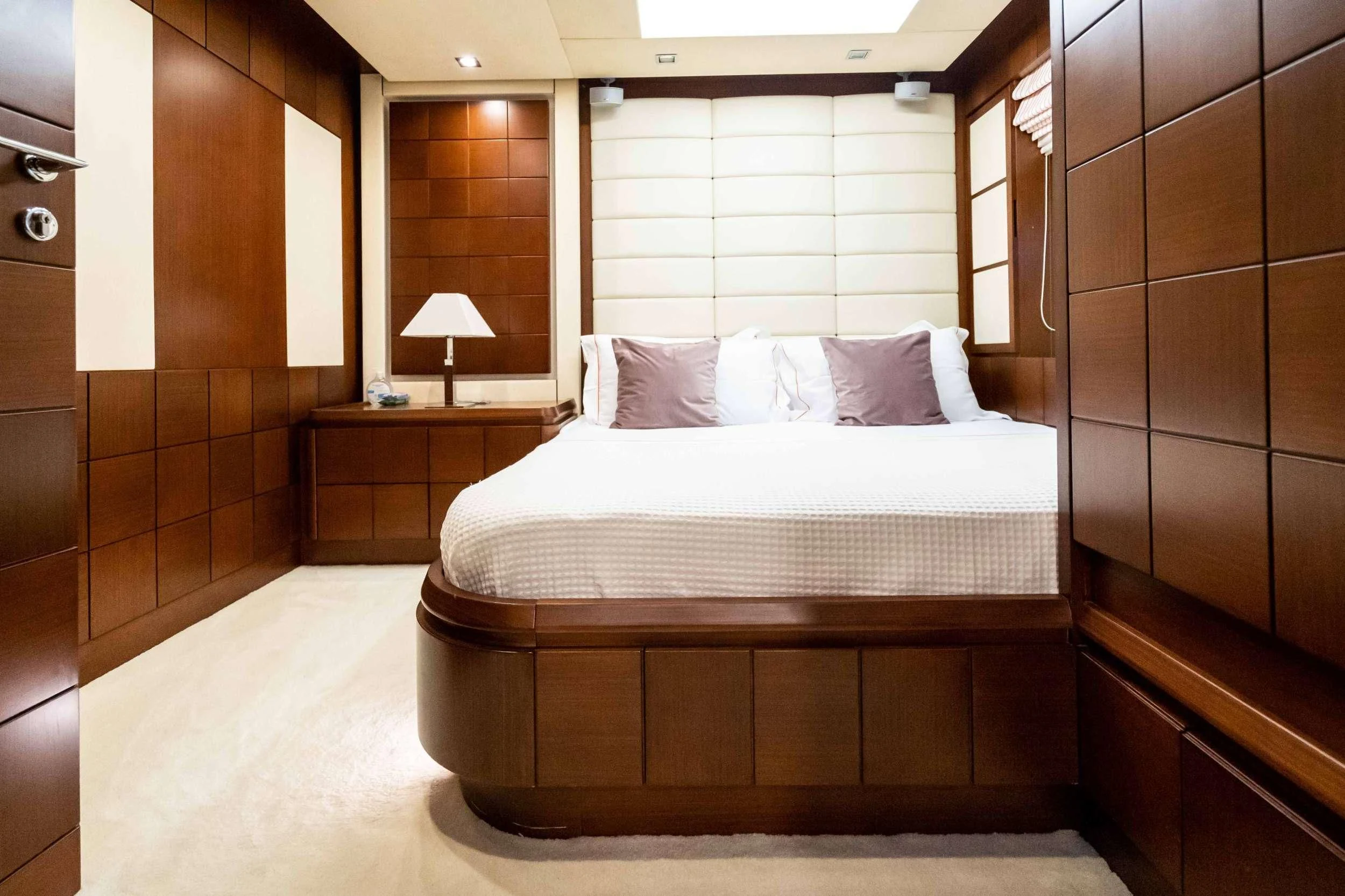 a bed in a room aboard KOUKLES Yacht for Sale