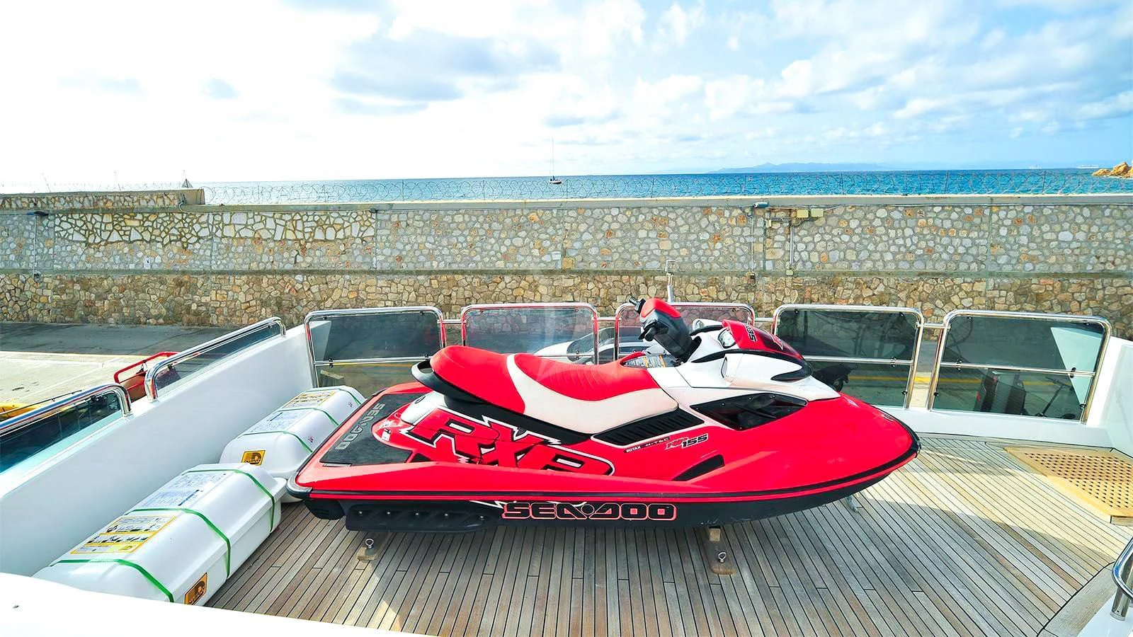 a group of race cars on a race track aboard KOUKLES Yacht for Sale