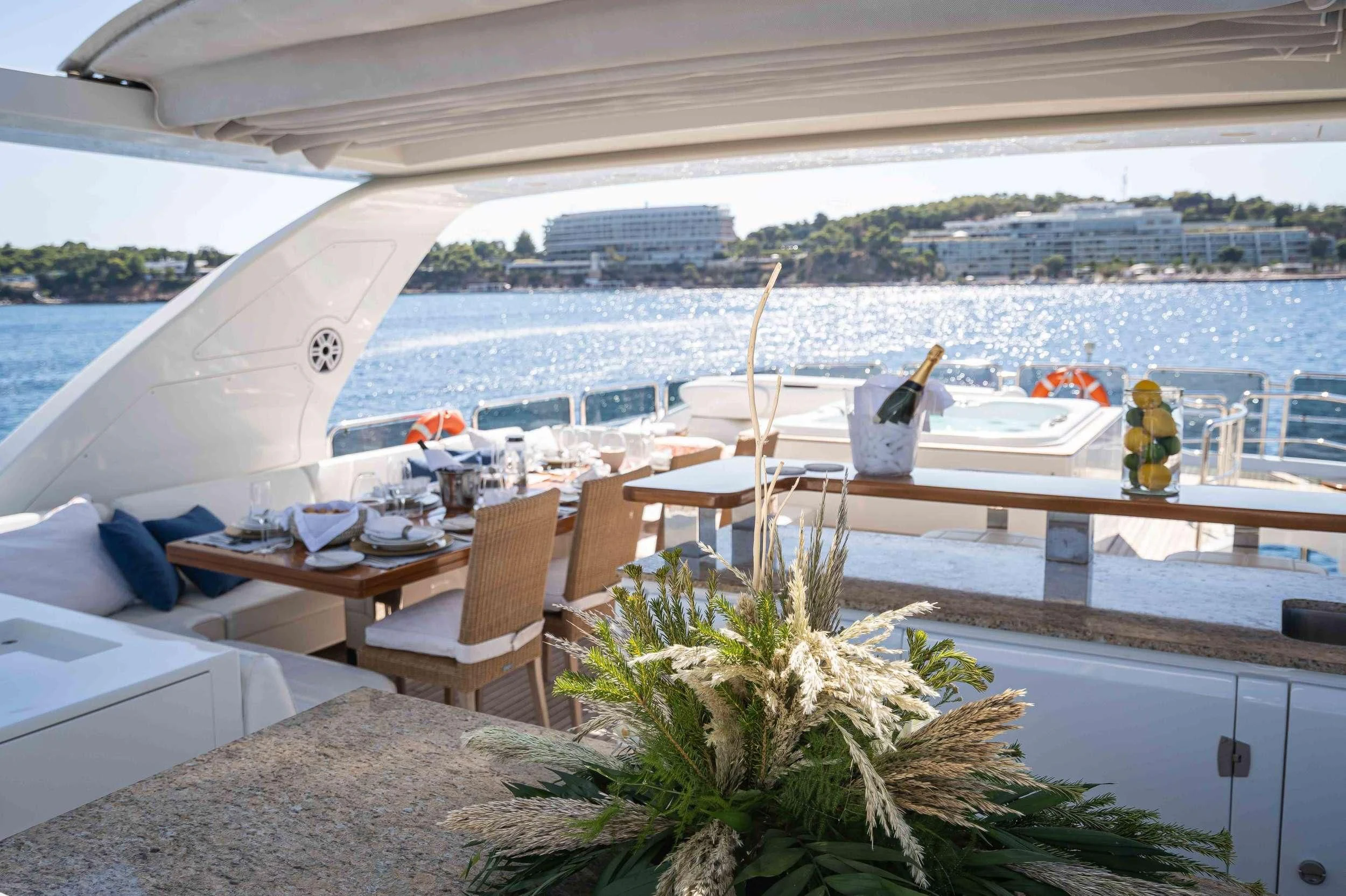 a room with a table and chairs aboard KOUKLES Yacht for Sale