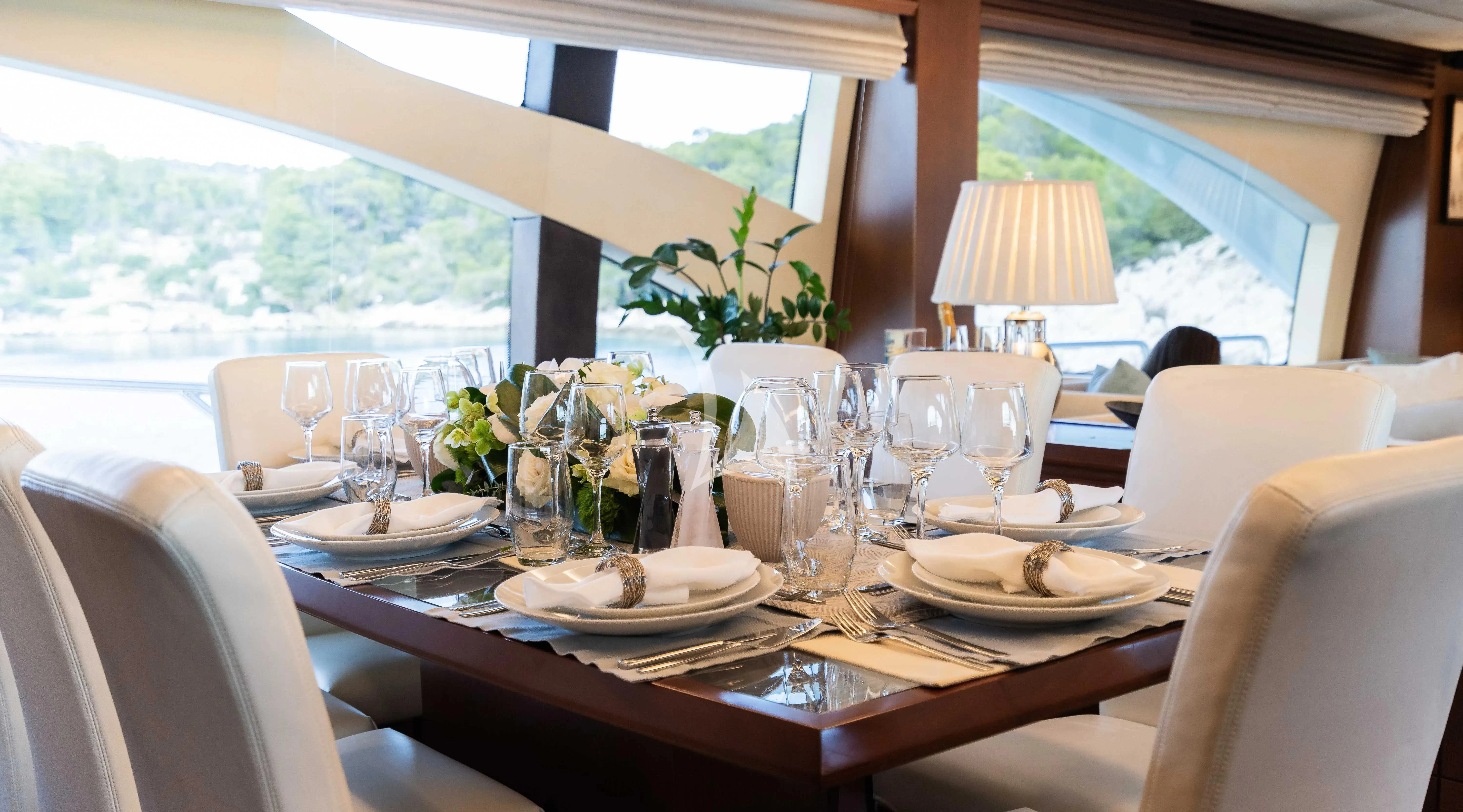 a table set for a dinner aboard KOUKLES Yacht for Sale