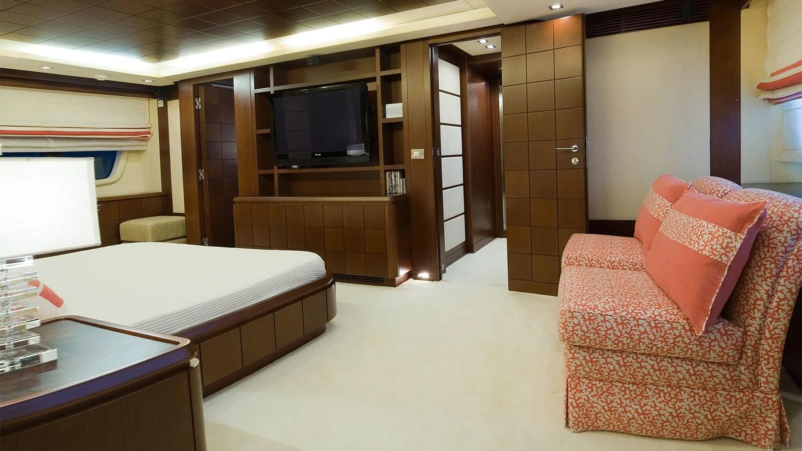 a room with a bed and a television aboard KOUKLES Yacht for Sale