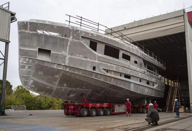 a group of people working on a construction site aboard VITTORIA VELOCE 32 RPH #01 Yacht for Sale