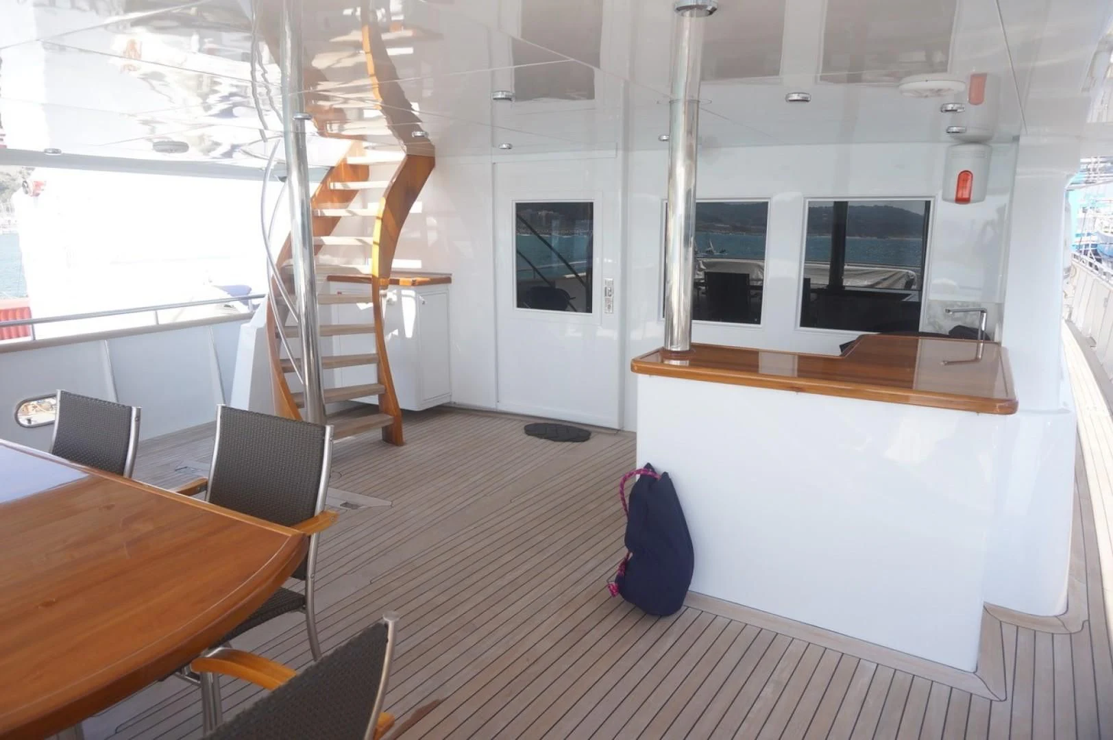 a room with a table and chairs aboard WIZARD ONE Yacht for Sale