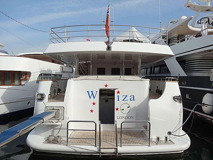 a boat with a door open aboard WIZARD ONE Yacht for Sale
