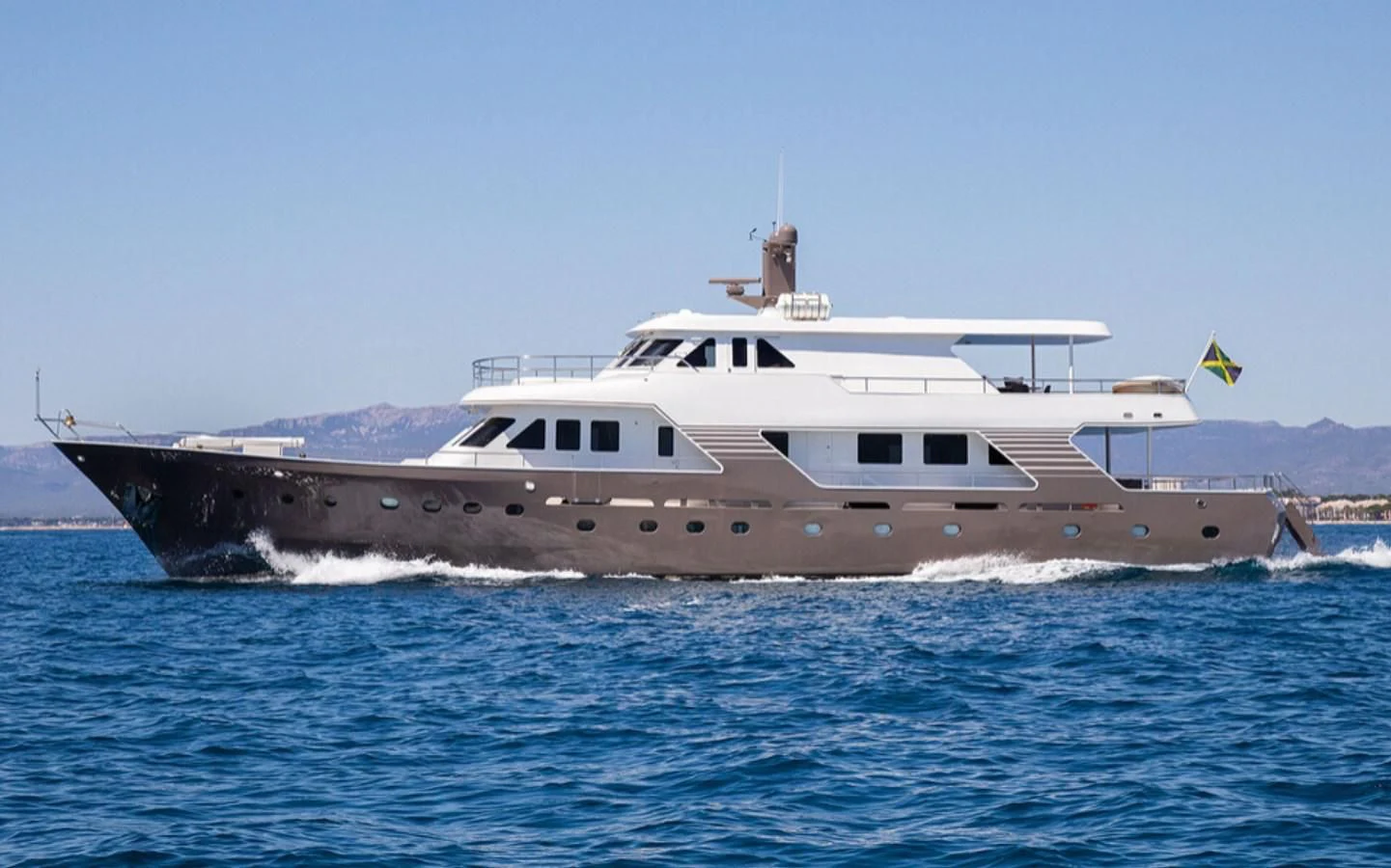 a large ship in the water aboard RA Yacht for Sale