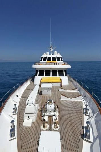 a boat on a deck aboard RA Yacht for Sale